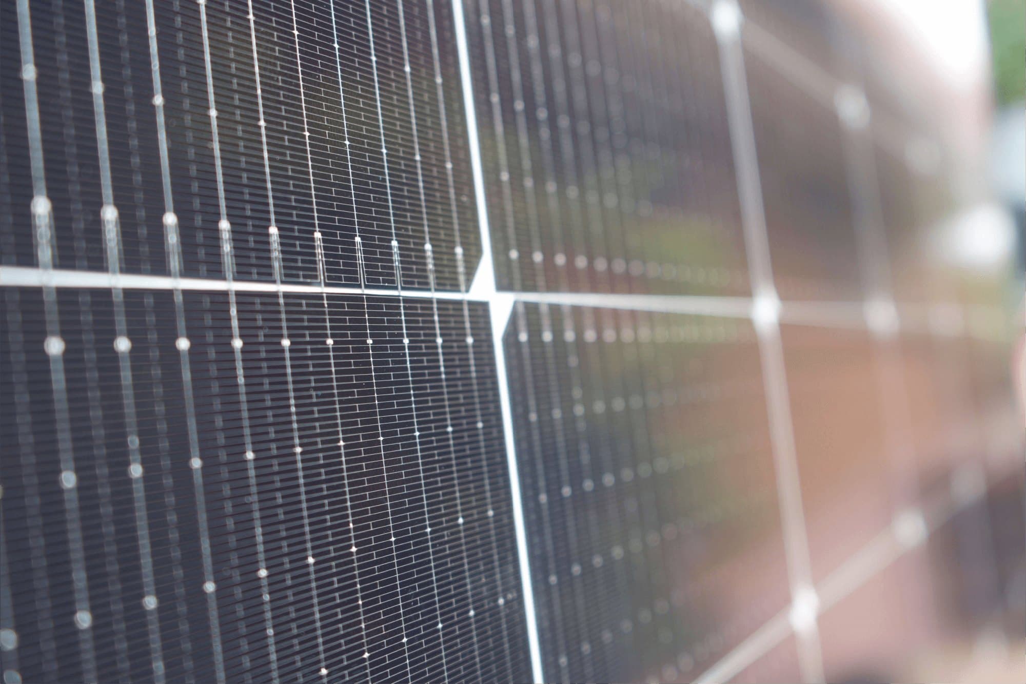 Close detail of solar panel cells and glass