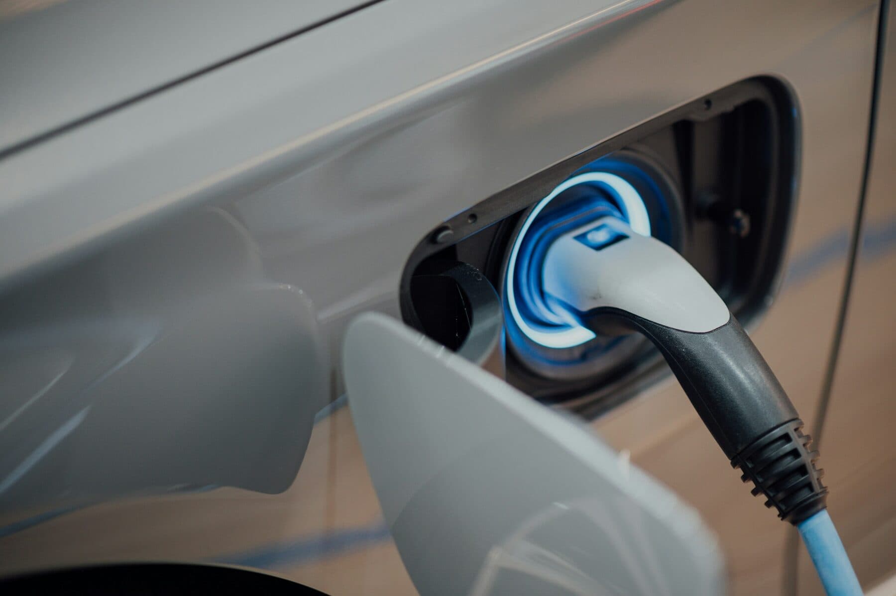 Charging plug connected to an electric vehicle