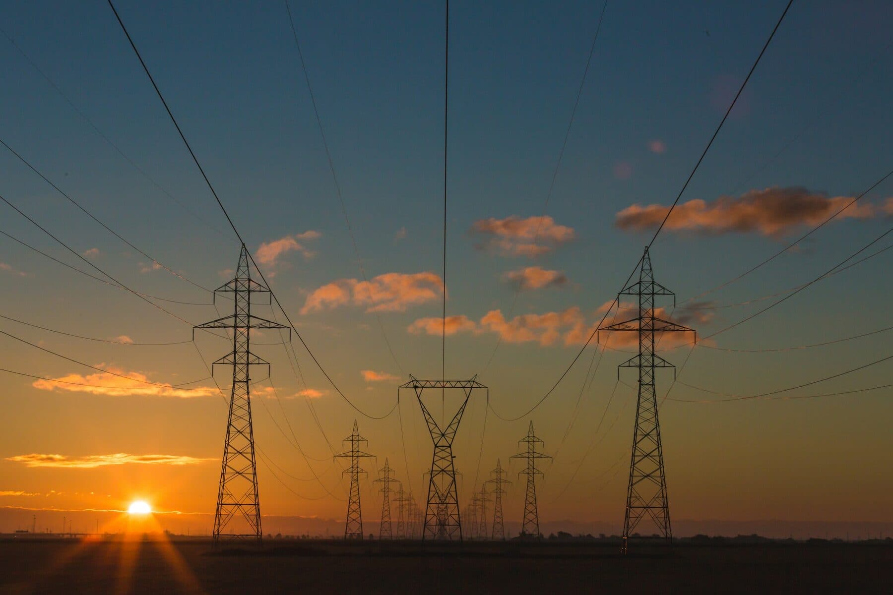 Power transmission lines at sunset