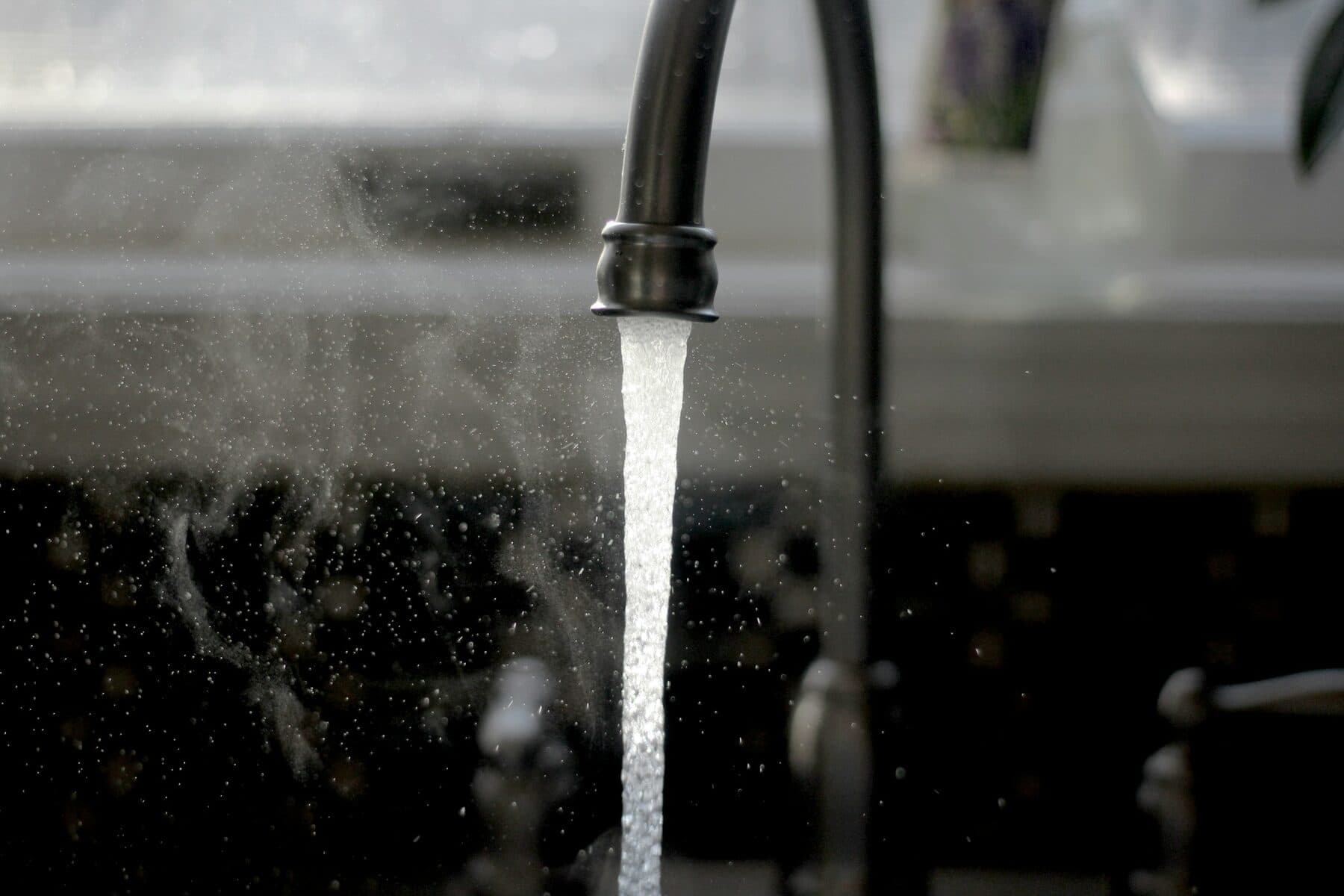 Hot water running from a tap