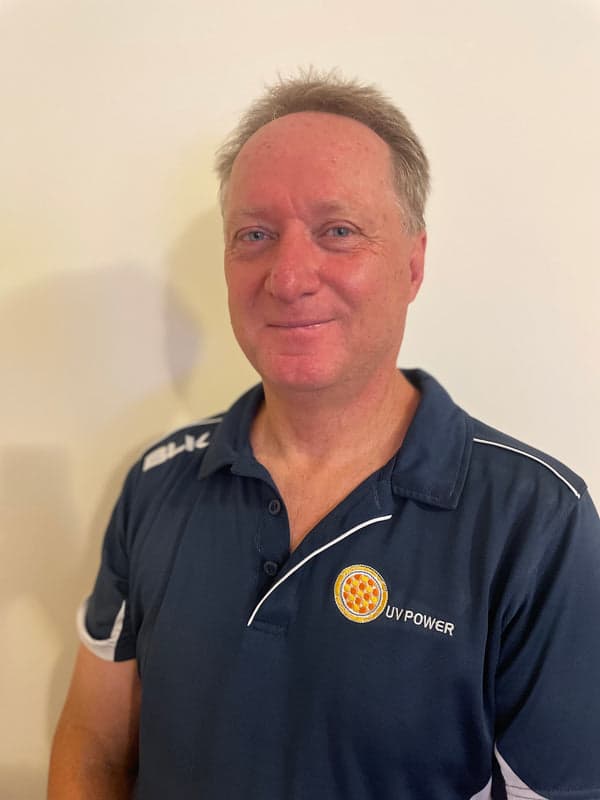 Malcolm Triplow, Solar Consultant at UV Power, in a UV Power uniform polo